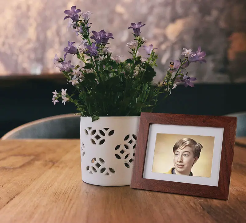 Photo frame near flowerpot Photo effect - Photo frame near flowerpot